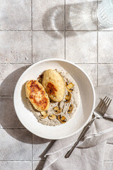 cutlets with mushroom puree and champignons