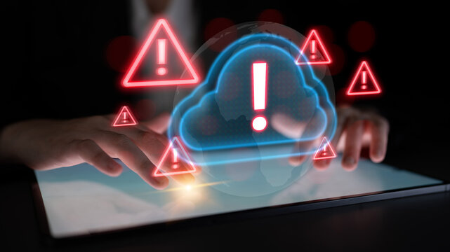Red alert triangles over a blue cloud icon, symbolizing cloud security threats, system warnings, and data protection risks in digital environments Parse - Powered by Adobe