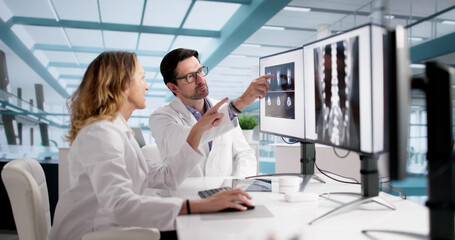 Naklejka premium Doctors Are Using X-ray Technology To Diagnose Bone Conditions On Screen