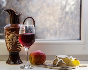 Still life with wine glass and Camembert cheese