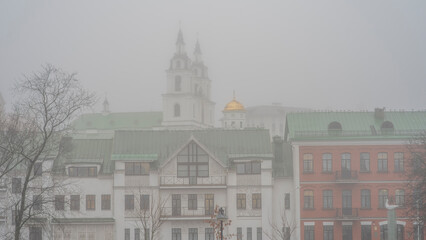 Obraz premium Foggy historical center of Minsk.