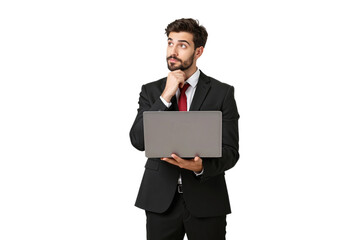 Thoughtful businessman in suit holding a laptop