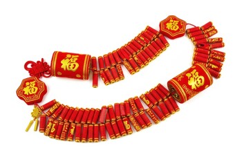 Decorative string of vibrant red firecrackers features golden auspicious characters for celebration