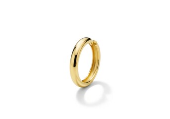 Smooth polished gold band rests subtly against a clean white background