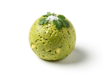 Obraz premium Spherical preparation of mashed avocado is topped with sea salt crystals and fresh herb garnish