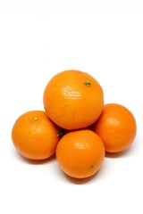 Stack of Fresh Mini Santang Oranges Isolated on White Background