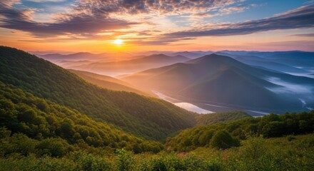 Mountain Vista at Sunset: A breathtaking vista unfolds as the sun dips below the horizon, painting the sky with vibrant hues over a rolling mountain range, creating a dramatic and serene scene.