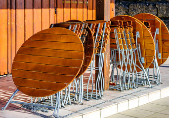 wooden benches and tables at a typical bavarian beergarden