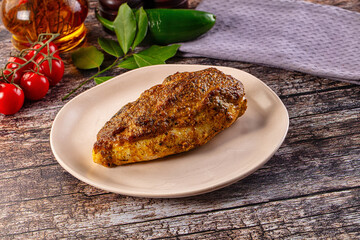 Baked chicken breast with spices and herbs