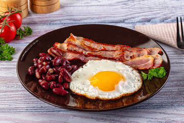 English breakfast with egg, bean and bacon