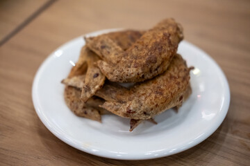Fried chicken served on plate
