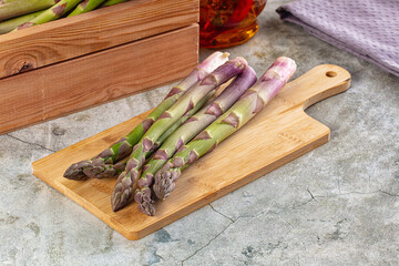 Fresh green asparagus sprouts heap