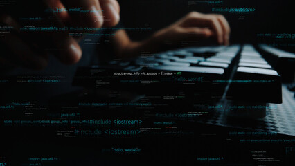 Close-up view of hands engaged in coding on a keyboard against a dark background, featuring code snippets and technology concepts, showcasing digital innovation. Xenic