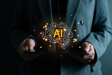 Artificial intelligence concept with businessman holding tablet. Glowing AI brain circuit graphic represents innovation, deep learning, and futuristic digital transformation in technology.