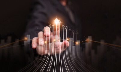 A hand pushing multiple arrows up. Growth, progress, and success concept in business, finance, investment, economy, career, spiritual, personal development, banking, stock market, and technology.