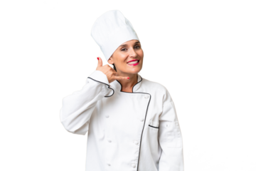 Middle-aged chef woman over isolated background making phone gesture. Call me back sign