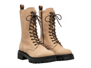 Pair of beige suede lace up combat boots isolated on transparent background