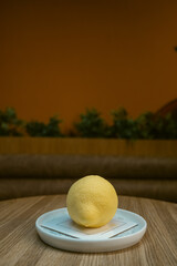 Lemon Shaped Dessert on a Plate. Lemon cake