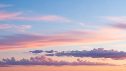 Obraz premium Soft Pastel Sunset Sky With Wispy Clouds