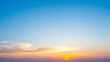 Obraz premium Vibrant Sunset Sky with Sun and Orange Clouds