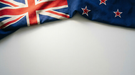 Close-up of the UK and New Zealand flags, perfect for patriotic themes or cultural representation...