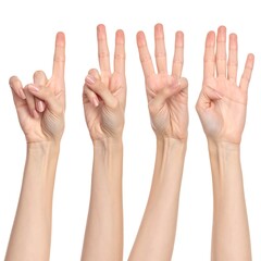 Series of human hands displaying the numbers one through five against a white background