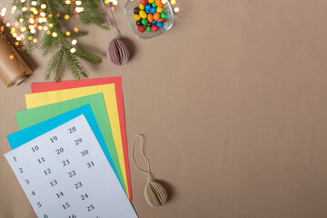 The triangles of the Advent calendar are made of thick cardboard.