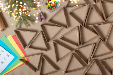 The triangles of the Advent calendar are made of thick cardboard. Step-by-step instructions. Step 4 make triangles