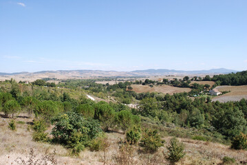 Obraz premium Panorama della Val d'Orcia da Bagno Vignoni in provincia di Siena, Toscana, Italia.