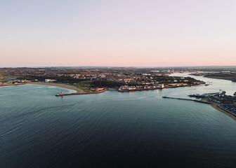 Tynemouth UK: 16th Aug 2025: Beautiful sunset view of South Shields and North Shields, Tynemouth along the River Tyne with calm waters and shipping heritage