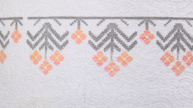 a decorative pattern on a paper towel product
