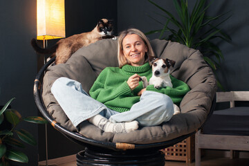 Woman Spending day with her Dog and Cat at Home