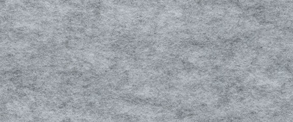 Fototapeta premium Soft light grey seamless felt material. Surface of felted fabric.
