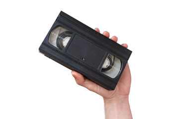 Retro VHS cassette in hand isolated on white background — vintage video tape, analog media, old technology concept