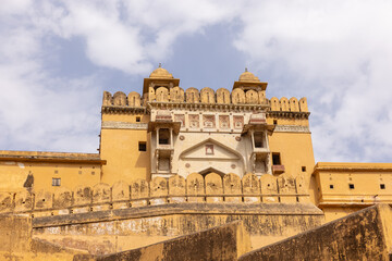 Fototapeta premium Architecture view of amber fort or amer fort palace of jaipur. Amber fort is a famous tourist destination of rajasthan. Tourists from entire world travel to amber fort and witness the palace.