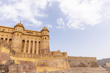 Naklejka premium Architecture view of amber fort or amer fort palace of jaipur. Amber fort is a famous tourist destination of rajasthan. Tourists from entire world travel to amber fort and witness the palace.
