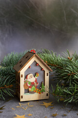 wooden christmas house decoration with santa illustration