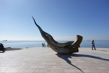 The seashell statue on Durr&euml;s beach, Albania,  reflects the city&rsquo;s deep connection to the sea, blending coastal beauty with local artistry.