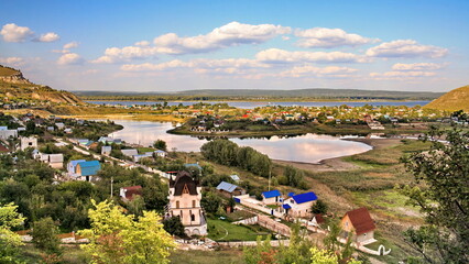 old russian village shiryaevo on the bank of the river volga zhigulevskie mountains on a summer day