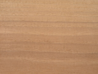 Striped blonde walnut wood surface with natural grain patterns