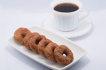 Delicious Fried Doughnuts on a White Background