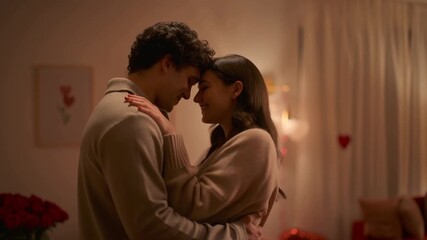 A loving couple embracing each other romantically, creating a scene of warmth and affection Stock video - Powered by Adobe