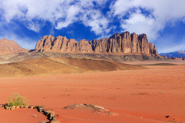 Wadi Rum Desert, Jordan. The red desert and Jabal Al Qattar mountain.