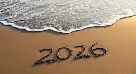 Happy New year 2026 is written in beach sand as waves New Year 2026 Advertisement