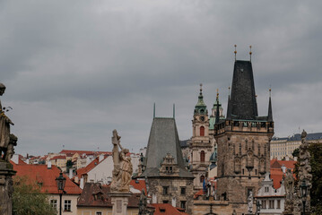 Fototapeta premium View of the tower of St. Charles Bridge in Prague, a symbol of the city in the Czech Republic
