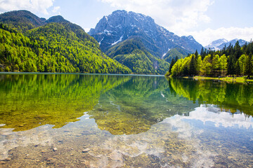 A magnificent landscape of Lake Del Predil (lago Del Predil) in Italy. Beautiful alpine lake, surrounded by Julian Alps. 