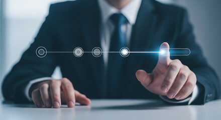 Businessman interacting with futuristic digital progress bar on screen