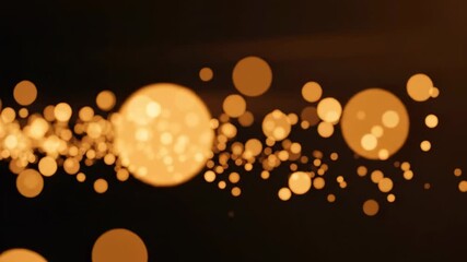Cinematic warm amber residual light bokeh floating slowly across a dark abstract digital background perfect for overlays gradient, background, dreamy