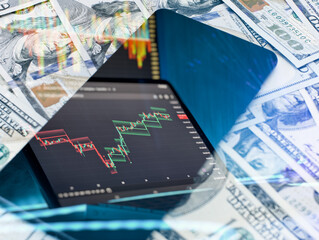 Stock trading chart overlayed with dollars