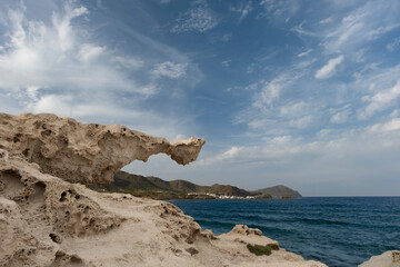 Fossil dune eroded by wind action at Los Escullos beach, in the Nature Reserve of Cabo de Gata -...